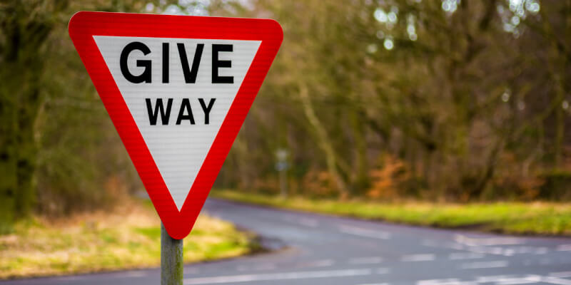 UK triangular give way sign with red outline